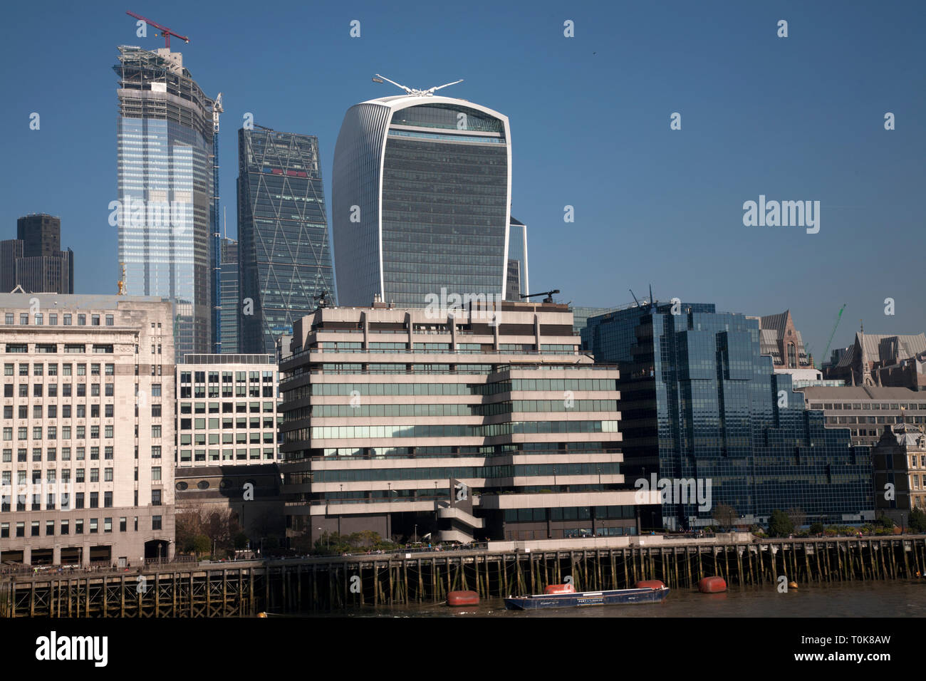 river thames and city of london skyscrapers london england Stock Photo