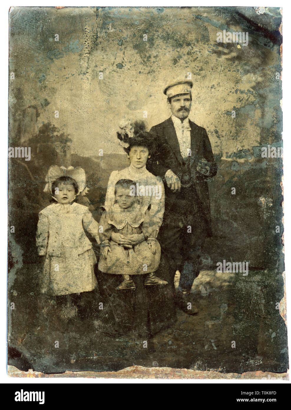 people, family, married couple with two children, ferrotype, heavily damaged, photographic negative on black sheet of iron, appears therefore as positive, Germany, circa 1900, Additional-Rights-Clearance-Info-Not-Available Stock Photo