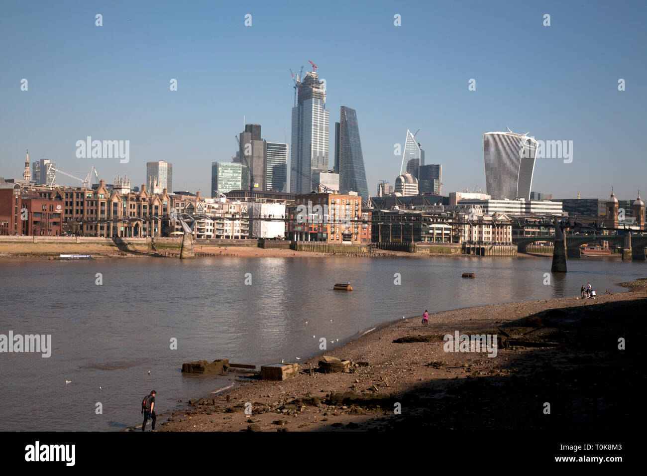 river thames foreshore and city of london in background london england Stock Photo