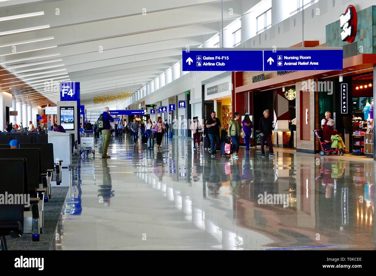People and shops in Terminal 3 of the Phoenix Sky Harbor Airport