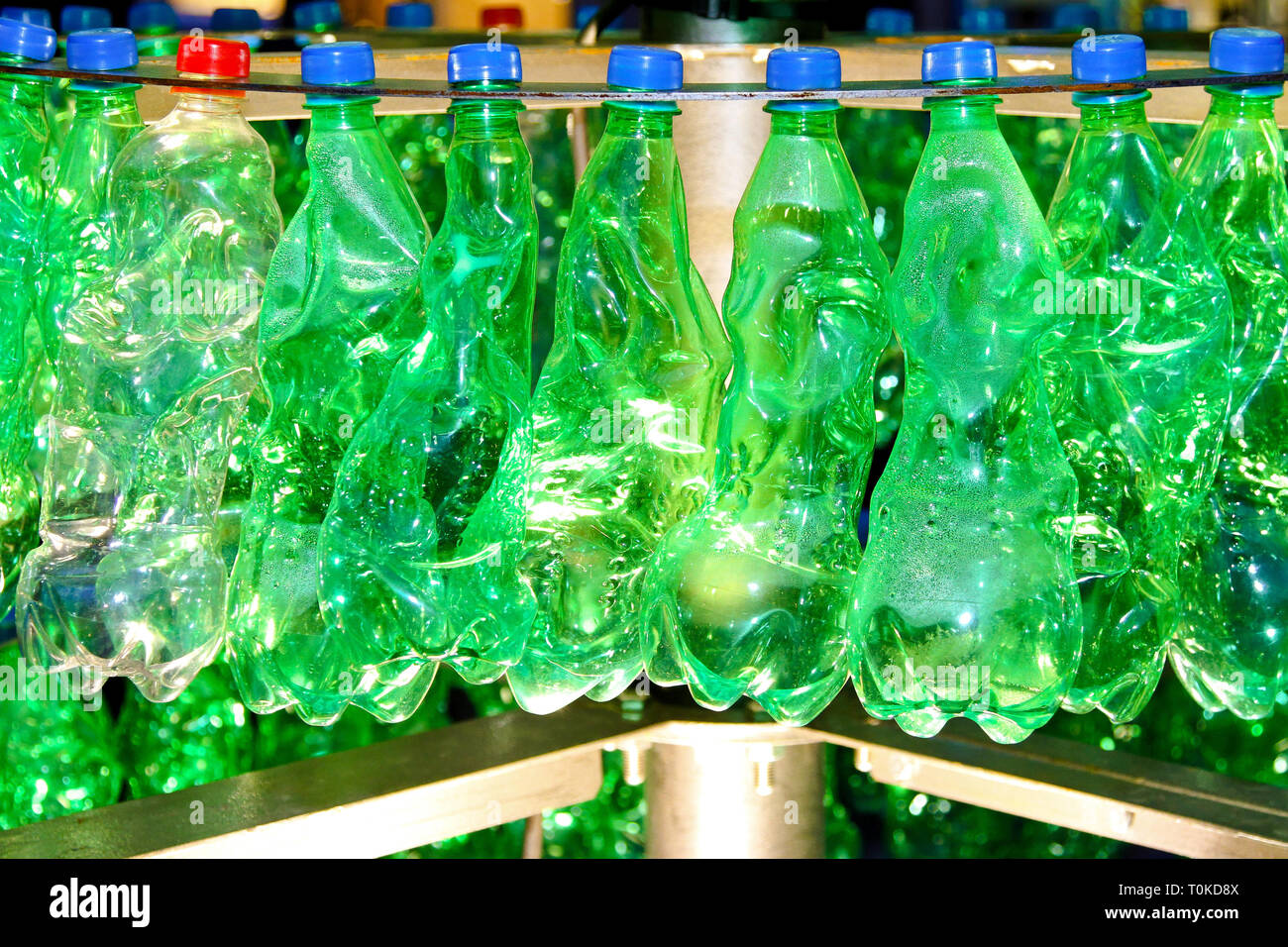 Green plastic bottles for environment recycling conservation Stock Photo