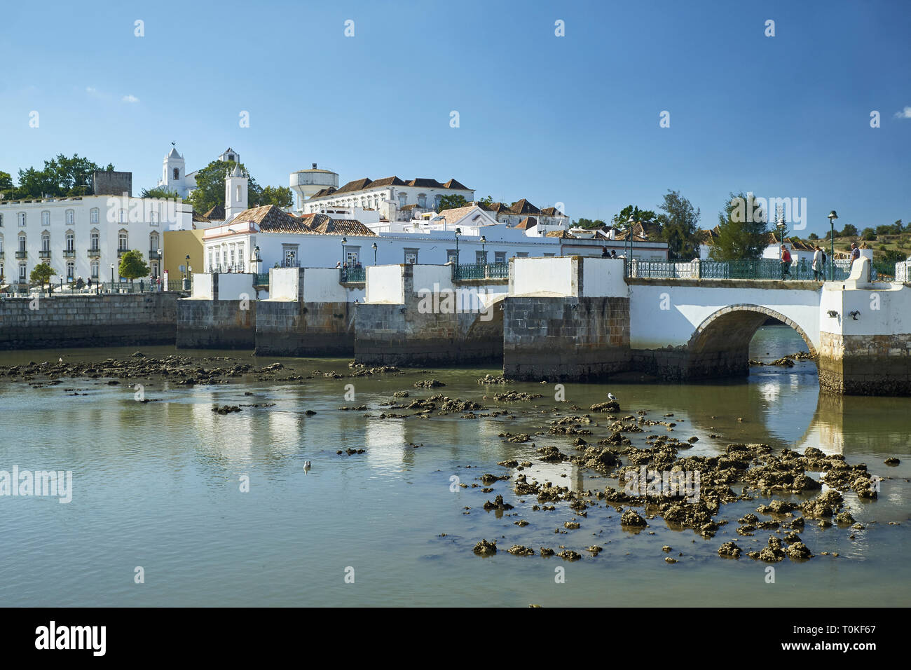 View to the Roman bridge over the river Gilao, Tavira, Algarve, Faro, Portugal Stock Photo