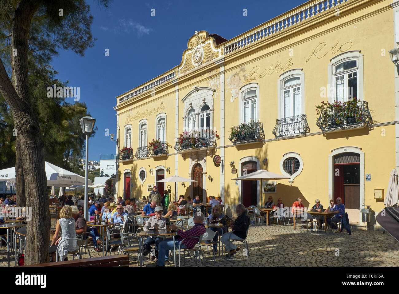 Open-air restaurant on the river Gilao in Tavira, Faro, Algarve, Portugal Stock Photo