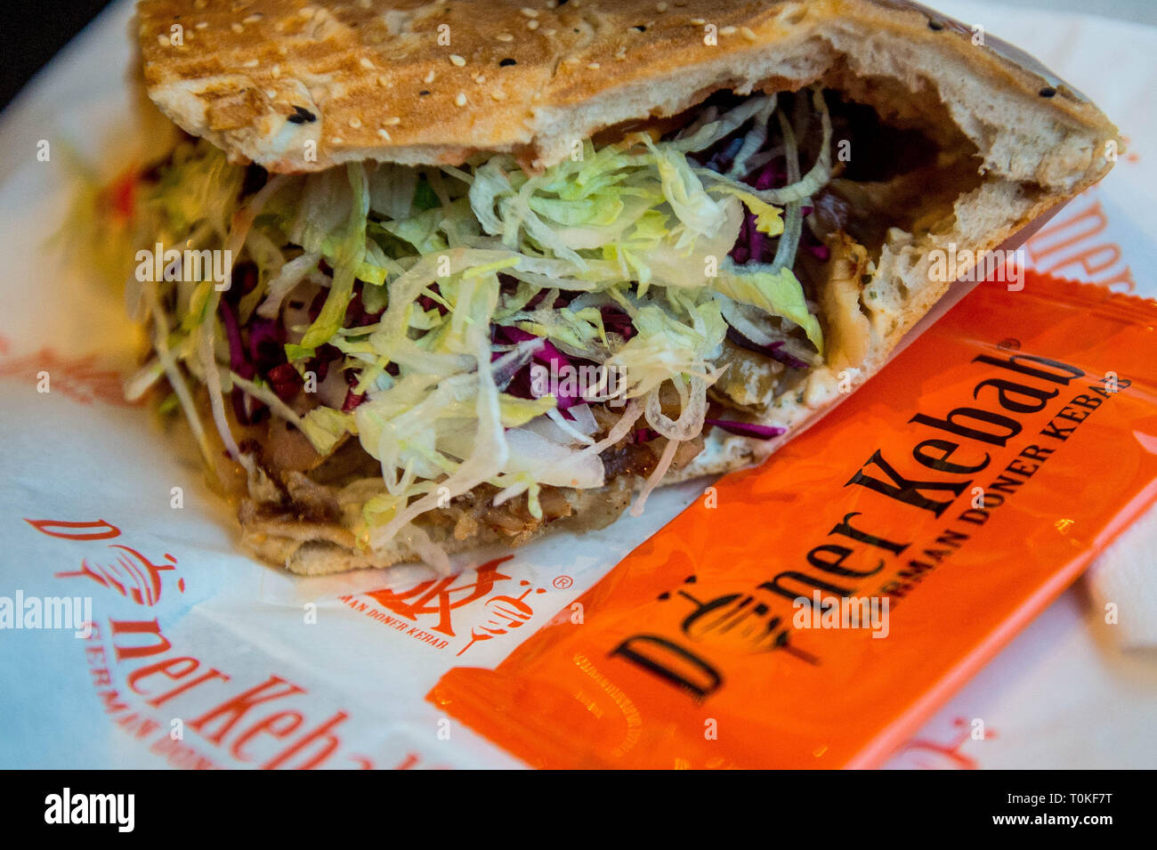 Detail of a Donner kebab meat being served in a Kebab shop Stock Photo