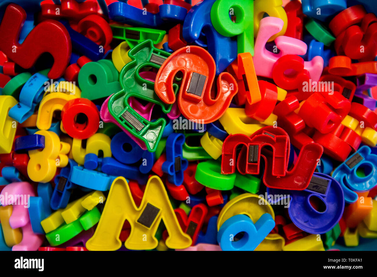 Colourful magnetic letters that you might put on a fridge or notice
