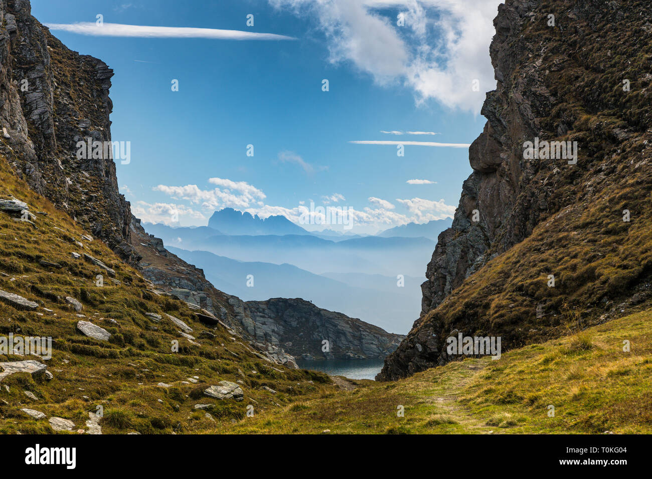 Hike to the Seefeldspitze, view to the Langkofelgruppe and Seefeldsee, Valser Tal, Pfunderer Mountains, South Tyrol, Italy Stock Photo