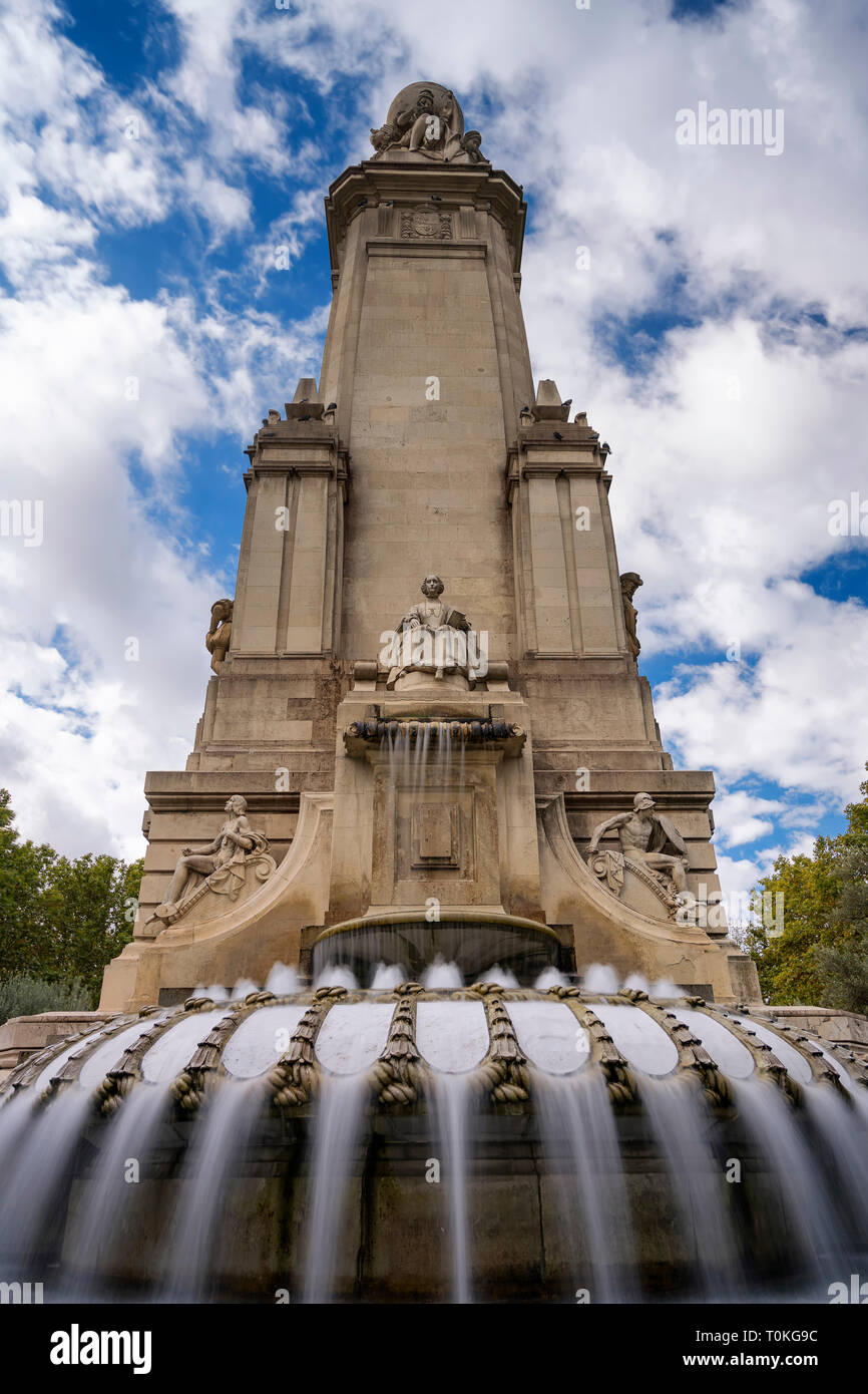 Fountain and Miguel de Cervantes Monument in Plaza de España Madrid. Stock Photo