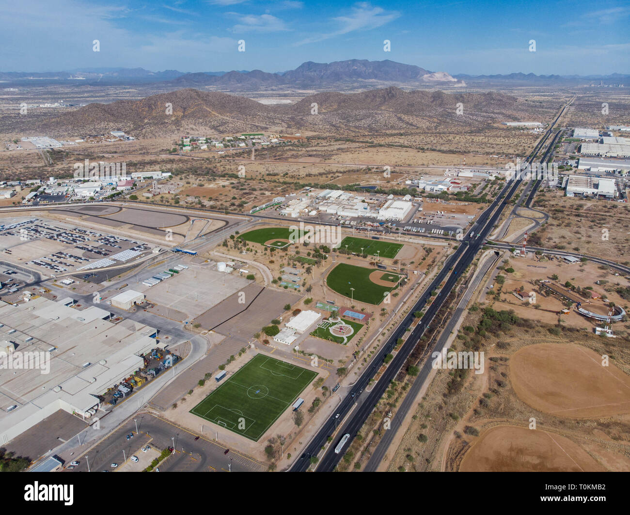 Aerial view of the Ford Motor Company automotive company in the Hermosillo industrial park. Automotive industry.  Hermosillo Stamping and Assembly is an automobile assembly plant of Ford Motor Company located in Hermosillo, Sonora, Mexico. The plant currently assembles the Ford Fusion and Lincoln MKZ, Lincoln models for the North American market. Ford is an American multinational automaker  .  Photo: (NortePhoto / LuisGutierrez)  ...  keywords: dji, aerial, djimavic, mavicair, aerial photo, aerial photography, urban landscape, aerial photography, aerial photo, urban, urban, urban, plane, archi Stock Photo