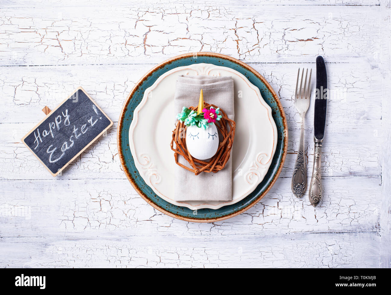Easter table setting with quail eggs Stock Photo