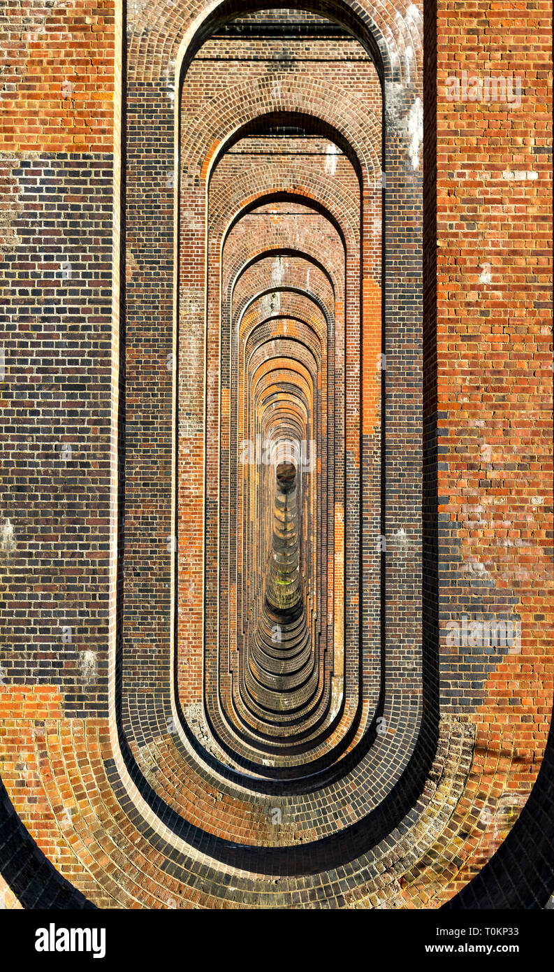 The Ouse Valley Viaduct looking through the arch holes Stock Photo