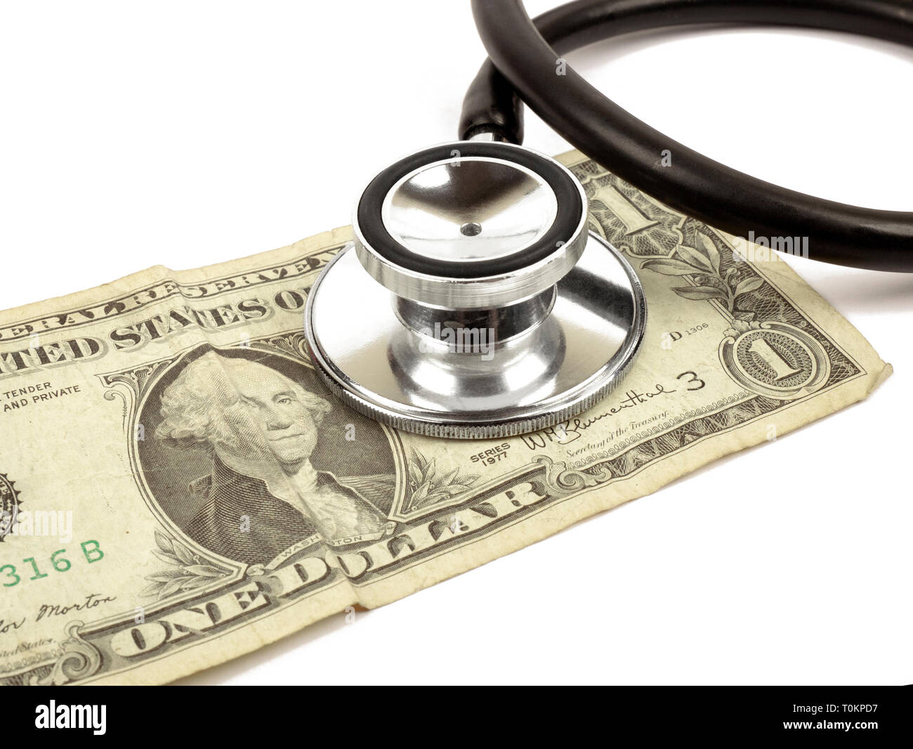 1 dollar with a stethoscope Stock Photo
