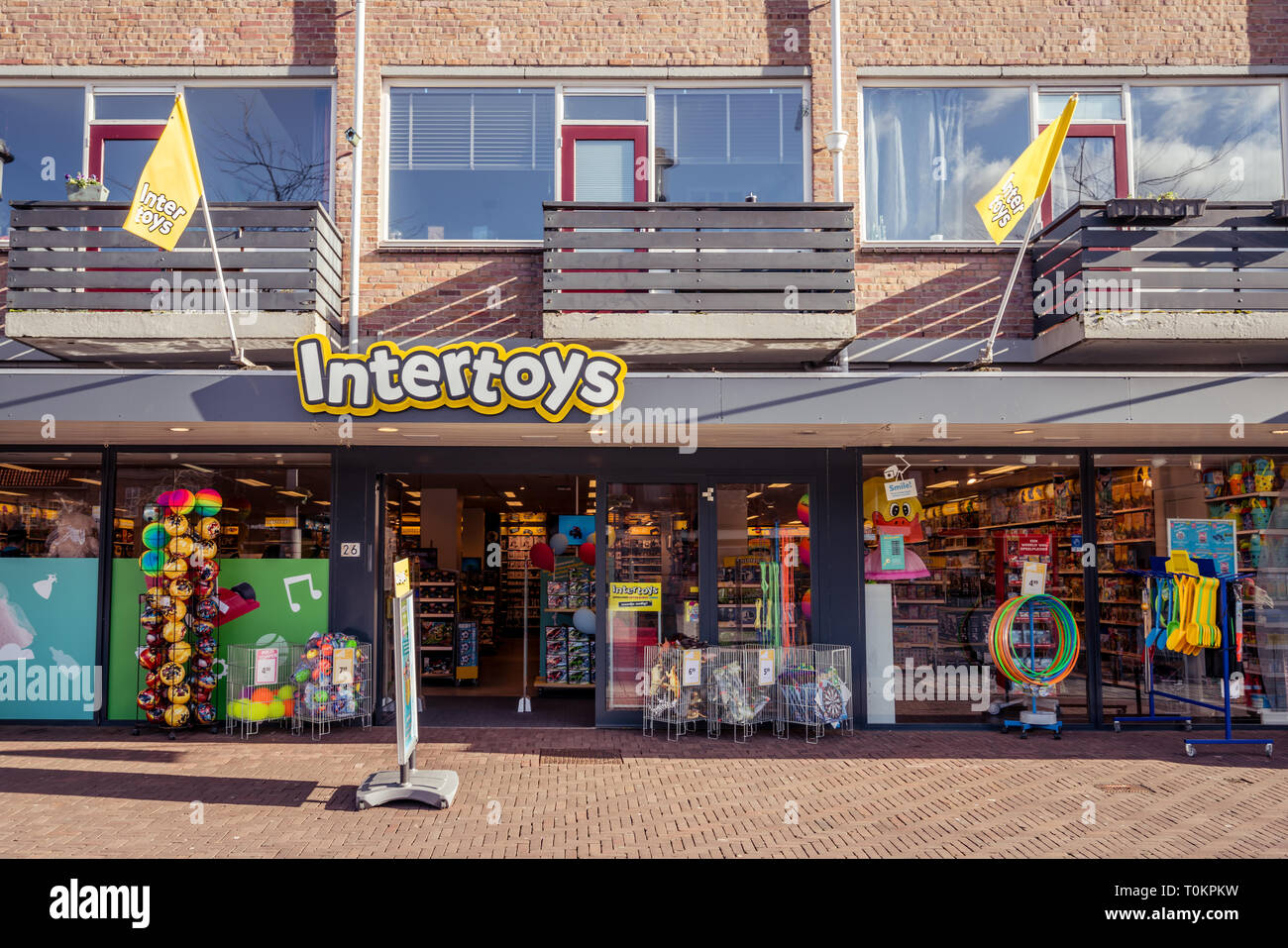 Dordrecht, The Netherlands - March 03, 2019: Street view of the Intertoys storefront and products displayed. Intertoys is a large retail store chain s Stock Photo