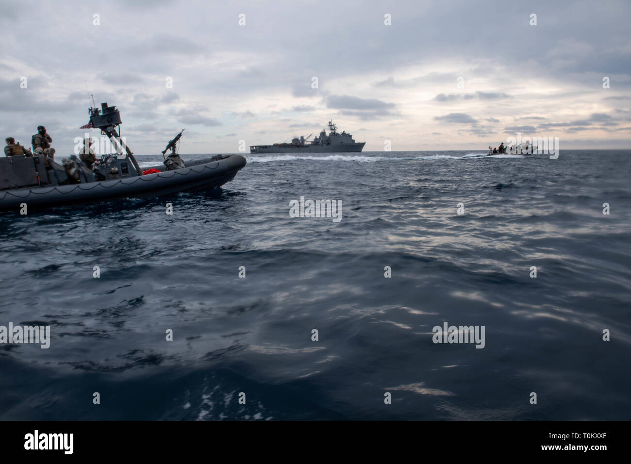 190319-N-HD110-0706  PACIFIC OCEAN (March 19, 2019) Sailors attached to Assault Craft Unit (ACU) 1 and Sailors apart of the visit, board, search, and seizure (VBSS) team from the Harpers Ferry-class amphibious dock landing ship USS Harpers Ferry (LSD 49 transit to a contact vessel during a VBSS exercise. Harpers Ferry is underway conducting routine operations as a part of USS Boxer Amphibious Ready Group (ARG) in the eastern Pacific Ocean. (U.S. Navy photo by Mass Communication Specialist 3rd Class Danielle A. Baker) Stock Photo