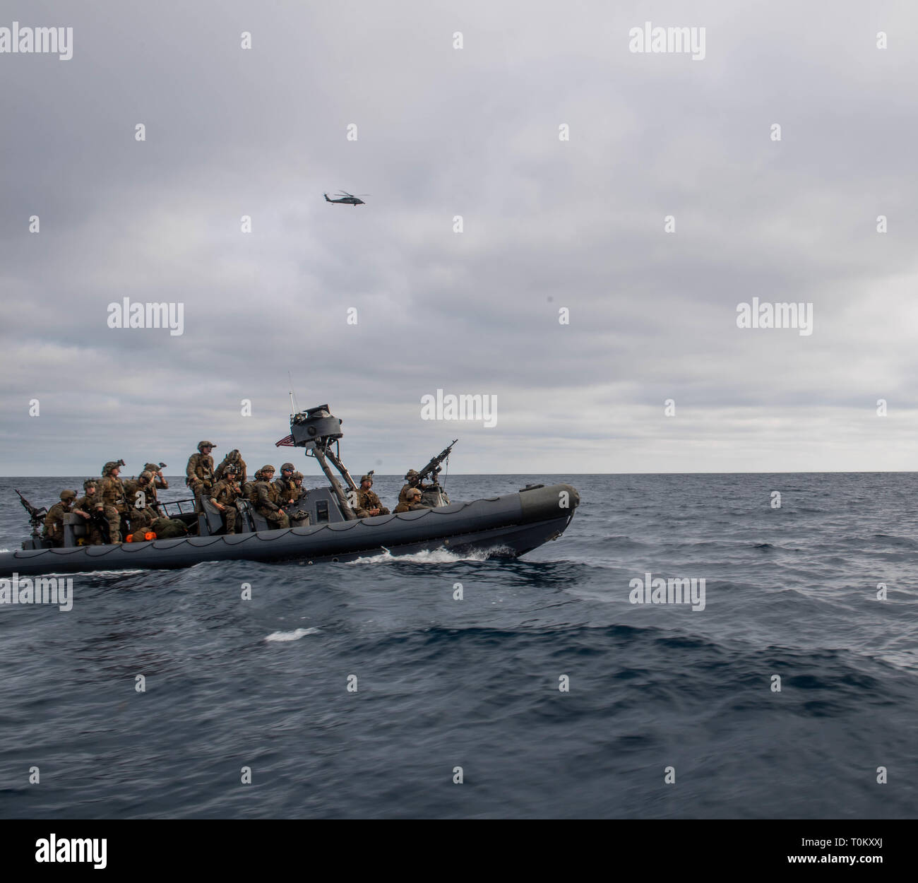 190319-N-HD110-0506  PACIFIC OCEAN (March 19, 2019) Sailors attached to Assault Craft Unit (ACU) 1 and Marines attached to Maritime Raid Force (MRF) transit to a contact vessel during a visit, board, search, and seizure exercise conducted by the Harpers Ferry-class amphibious dock landing ship USS Harpers Ferry (LSD 49). Harpers Ferry is underway conducting routine operations as a part of USS Boxer Amphibious Ready Group (ARG) in the eastern Pacific Ocean. (U.S. Navy photo by Mass Communication Specialist 3rd Class Danielle A. Baker) Stock Photo