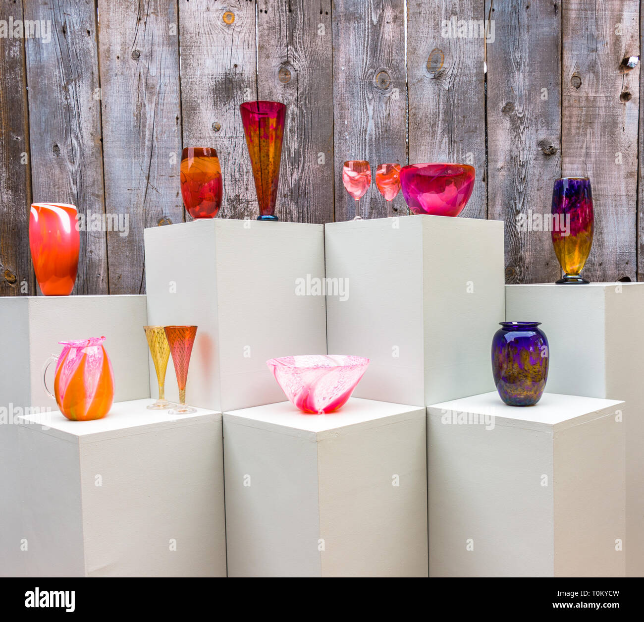 Glass Decorative Accessories are tools for decoration. Interior or home decor to bring color to your rooms and work place. The photo has bowls, cups. Stock Photo