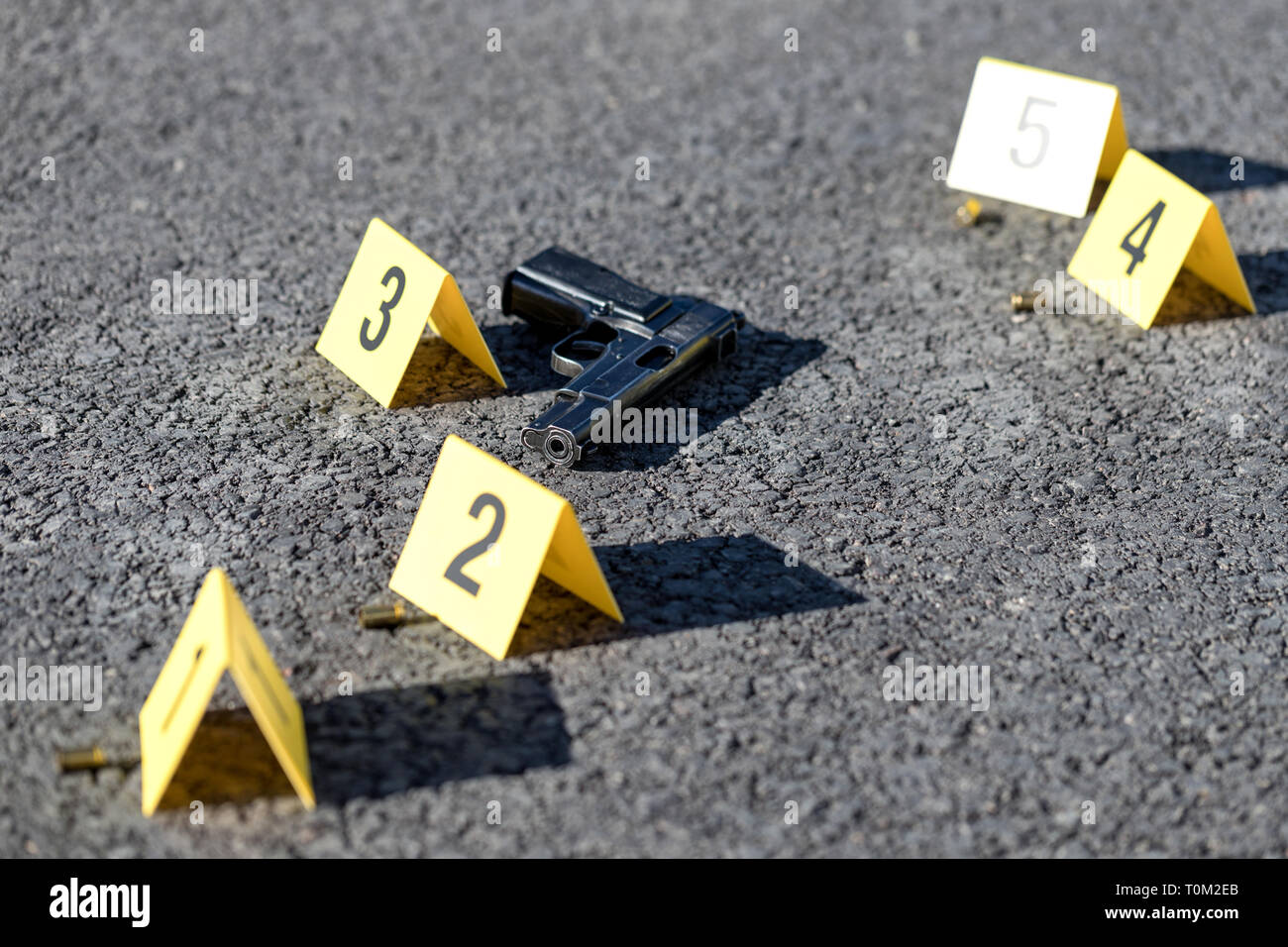ID tents at crime scene after gunfight Stock Photo