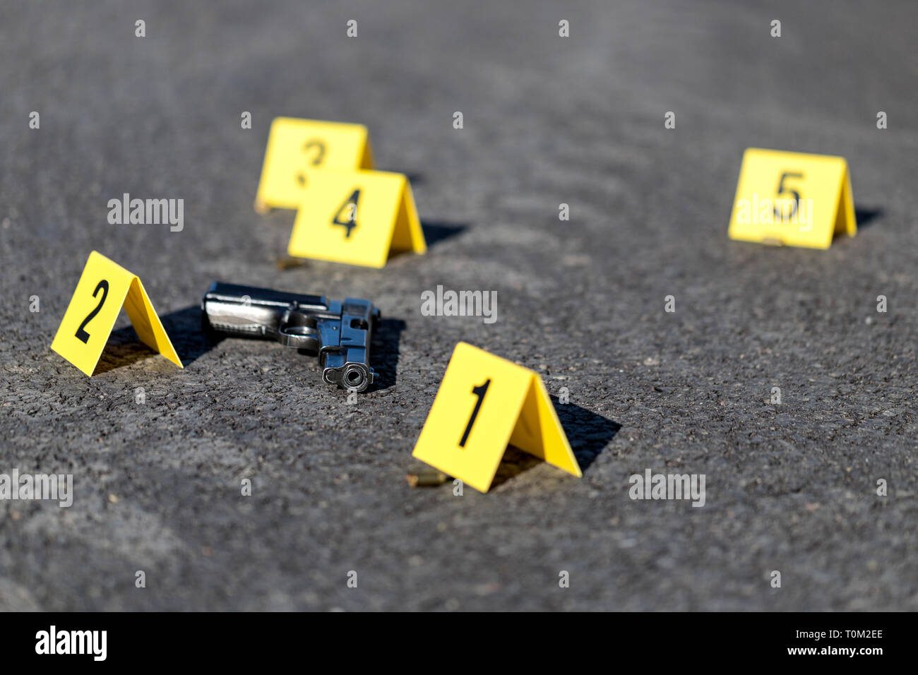 ID tents at crime scene after gunfight Stock Photo