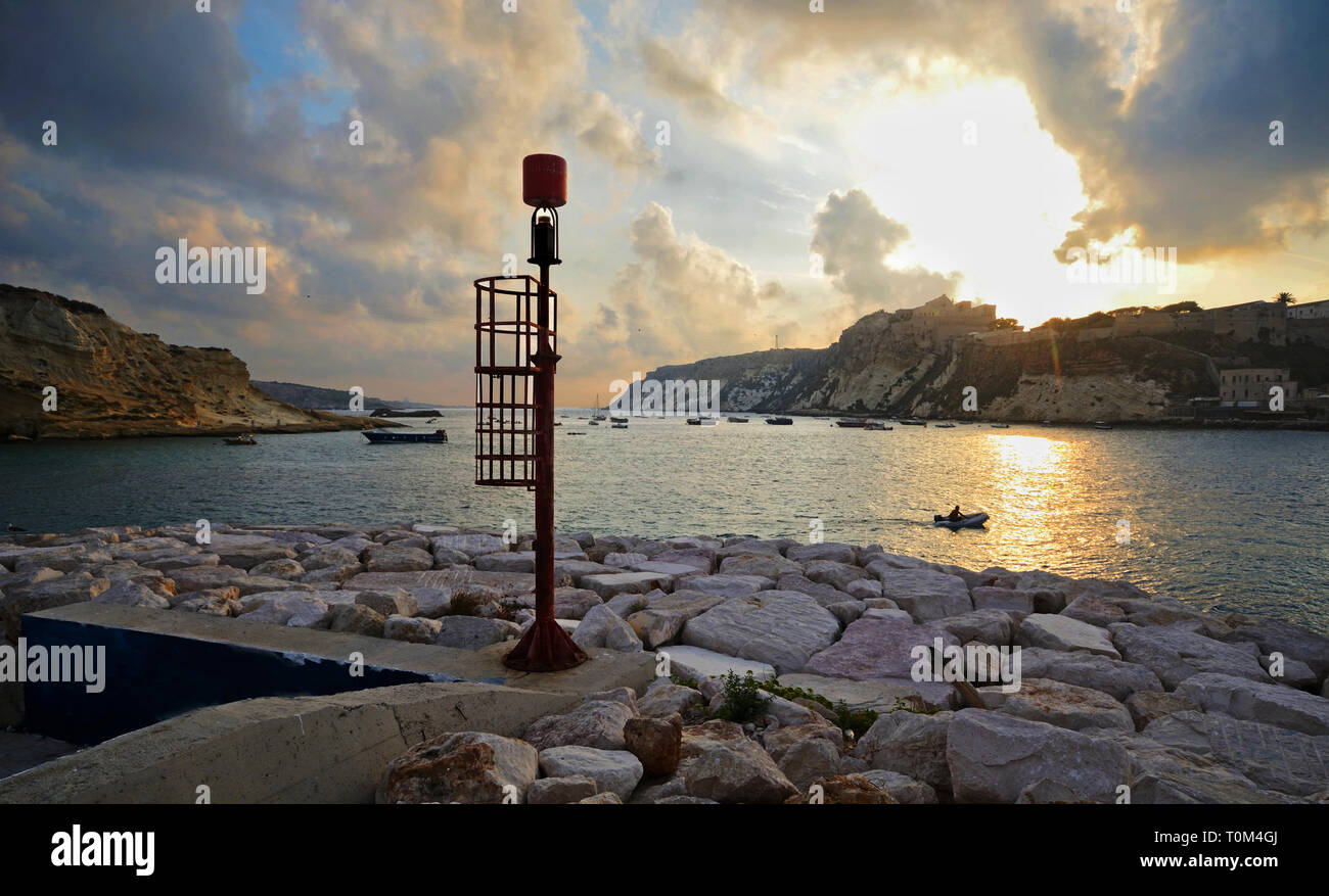 scenic view of the rocky coast of Tremiti island during sunrise Stock Photo