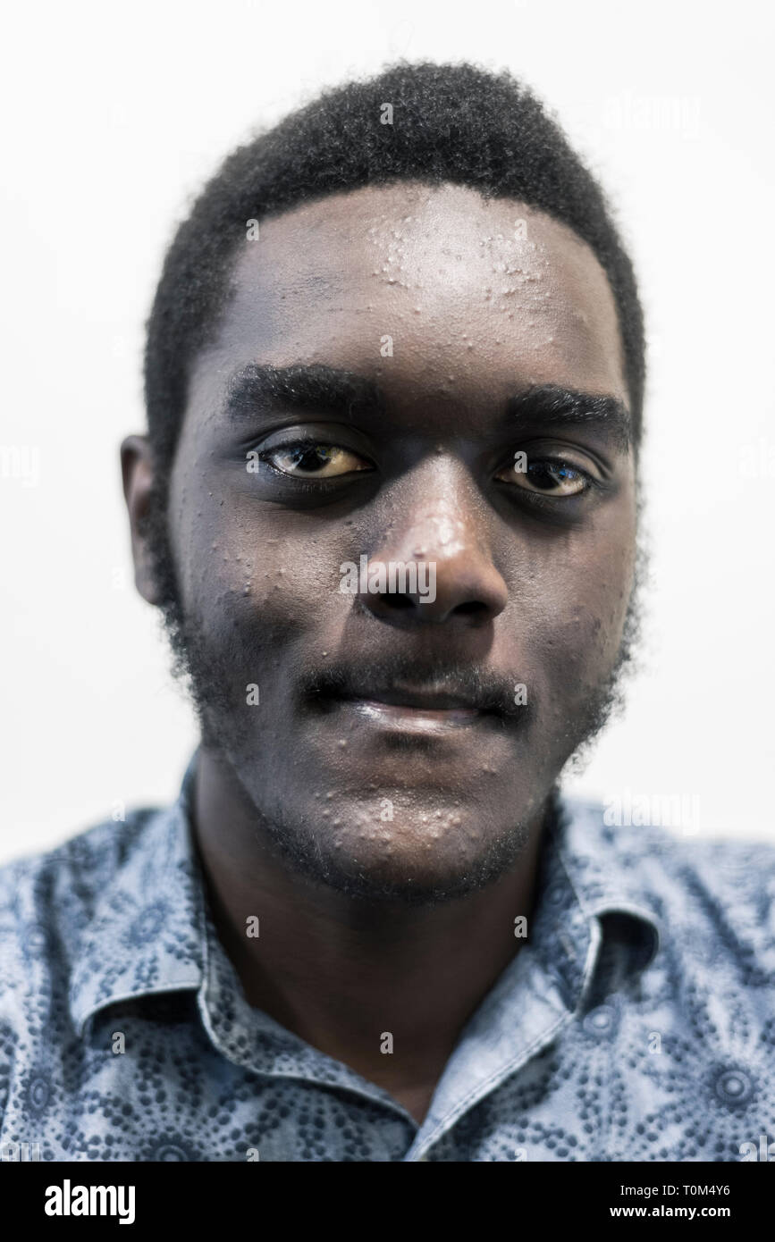 close up portrait of a young black man Stock Photo - Alamy
