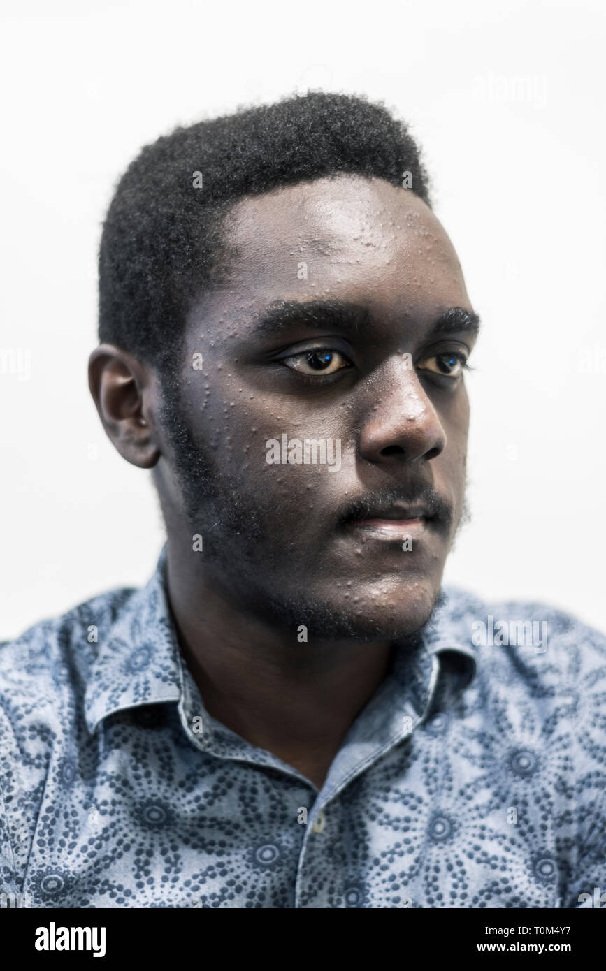 close up portrait of a young black man Stock Photo