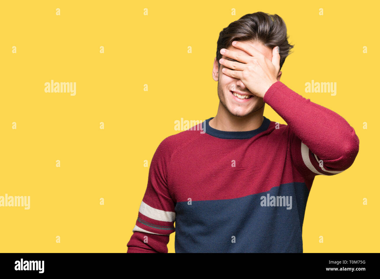 Young handsome man over isolated background smiling and laughing with ...