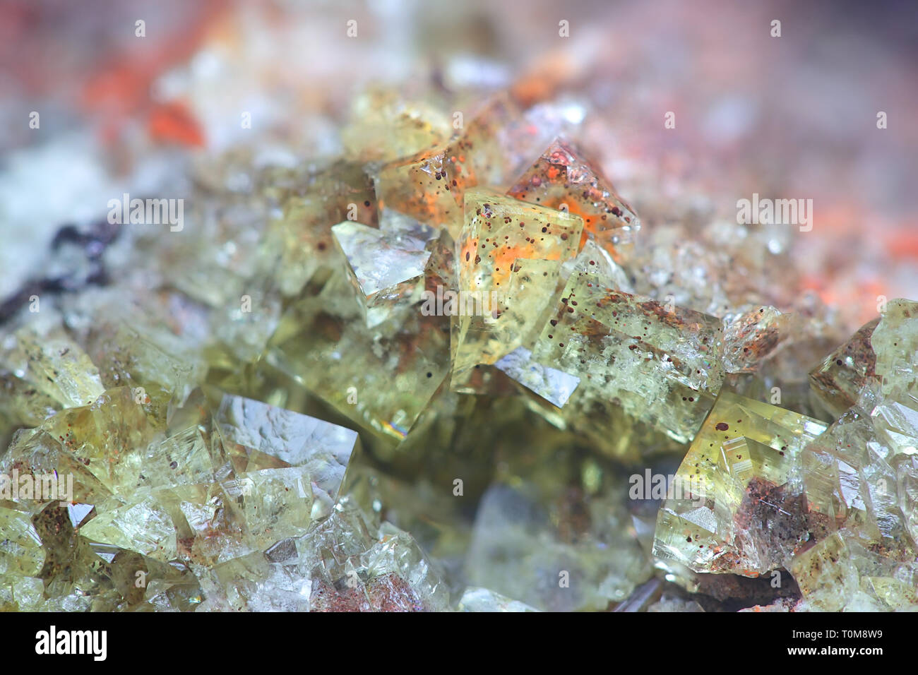 Crystals of fluorite with hematite inclusions from Illo calcite quarry in Finland Stock Photo