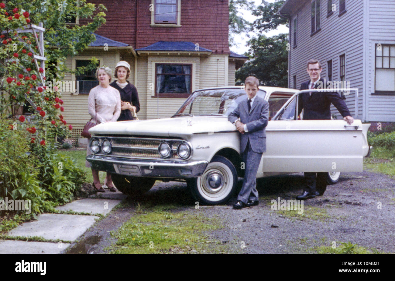 transport / transportation, car, vehicle variants, Mercury Comet, a brand of the Ford Motor Company, coupe, two-door, 85 horsepower, build since 1960, family is posing with their new Mercury Comet in front of their house, Cleveland, Ohio, USA, 1961, Additional-Rights-Clearance-Info-Not-Available Stock Photo
