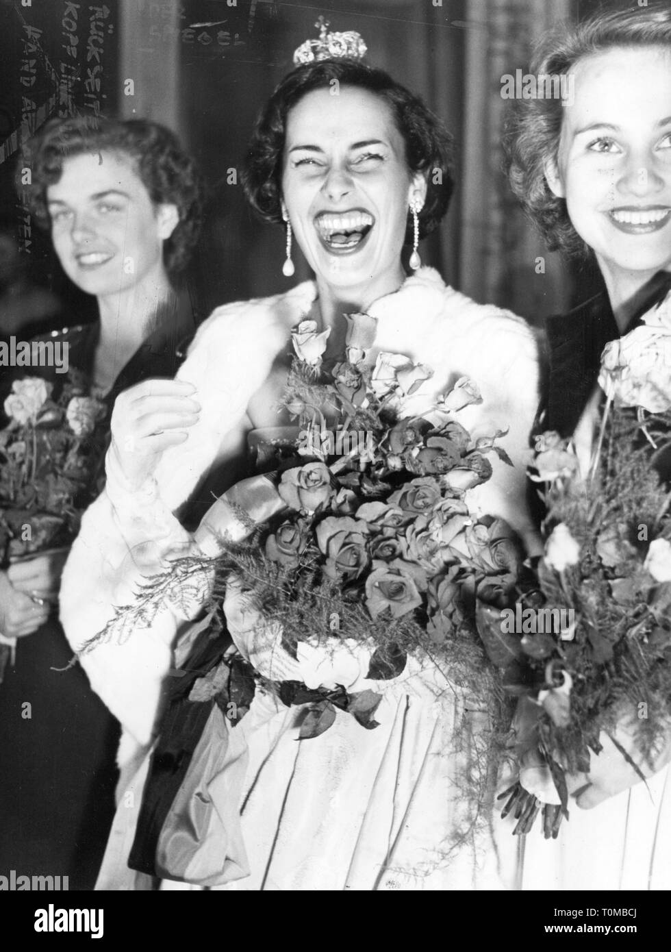 people, women, beauty pageants, Miss Germany 1950, winner Susanne Erichsen, half length, kurhaus, Baden-Baden, 2.9.1950, 20th century, 1950s, 50s, Germany, Baden - Baden, beauty contest, beauty contests, beauty queen, beauty queens, beauty, beauties, belle, belles, standing, laugh, laughing, joy, happiness, happy, crown, crowns, jewellery, jewelry, ear ring, earring, ear rings, earrings, flower, flower bouquet, bunch of flowers, bouquets, roses, fur stole, stole, fur, furs, ermine, Miss Schleswig-Holstein, Miss Schleswig - Holstein, mannequin, fa, Additional-Rights-Clearance-Info-Not-Available Stock Photo