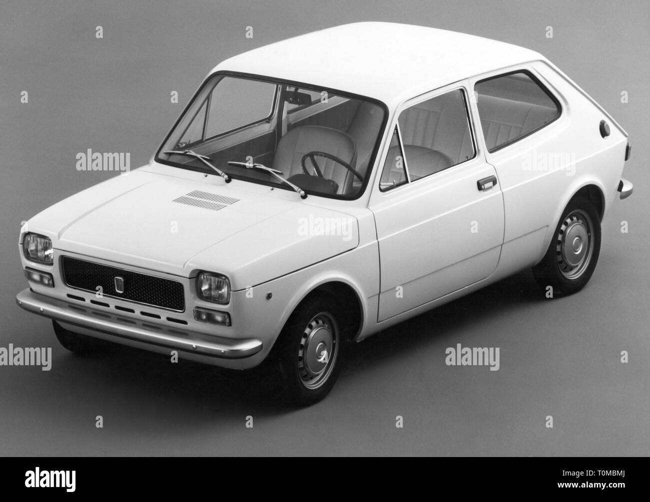 transport / transportation, car, vehicle variants, Fiat 127, view from left ahead, 1973, clipping, cut out, cut-out, cut-outs, small car, hatchback, car of the year 1972, Italy, vehicle, vehicles, motor car, auto, automobile, motorcar, motorcars, autos, automobiles, passenger cars, passenger coach, passenger car, 1970s, 70s, 20th century, no-people, transport, transportation, vehicle variants, vehicle variants, view, views, historic, historical, Additional-Rights-Clearance-Info-Not-Available Stock Photo