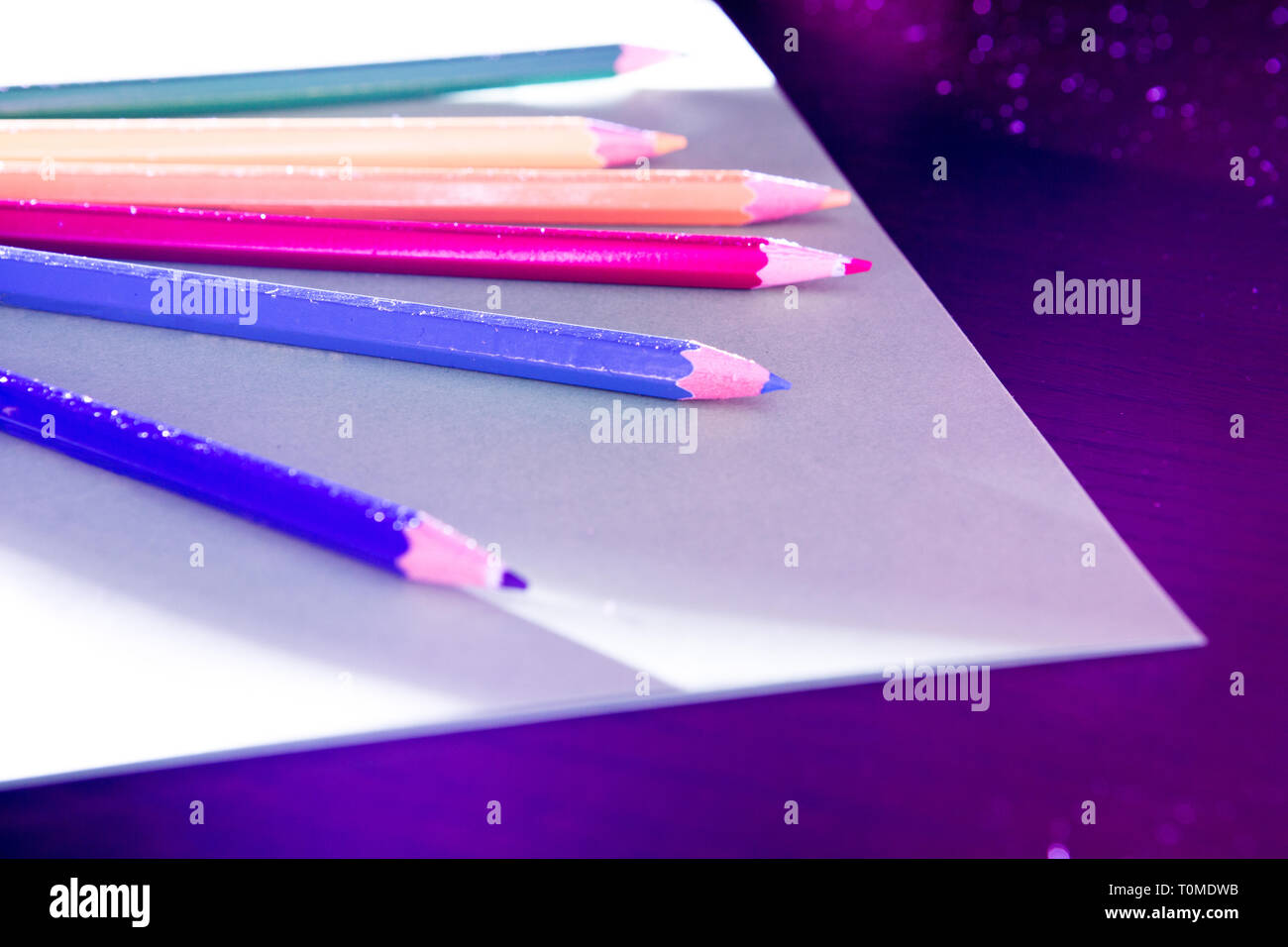 Colored pencils in colorful lighting Stock Photo Alamy