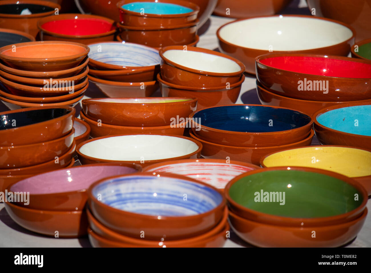 variety of colorful ceramic bowls, pottery Stock Photo Alamy
