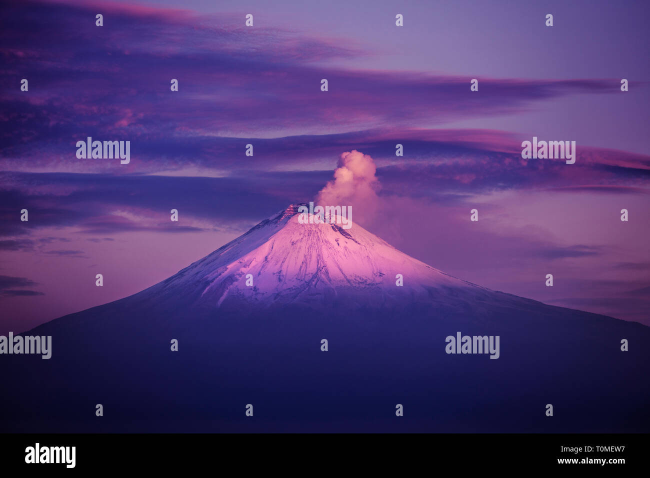 A sunset view of the active volcano Popocatépetl located in Puebla city, Mexico Stock Photo