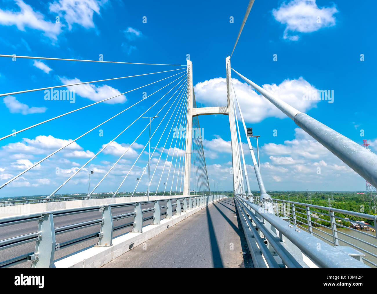 Traffic on Cao Lanh bridge cable stayed on the Mekong River in the morning connects the city of Cao Lanh and Lap Vo District Stock Photo
