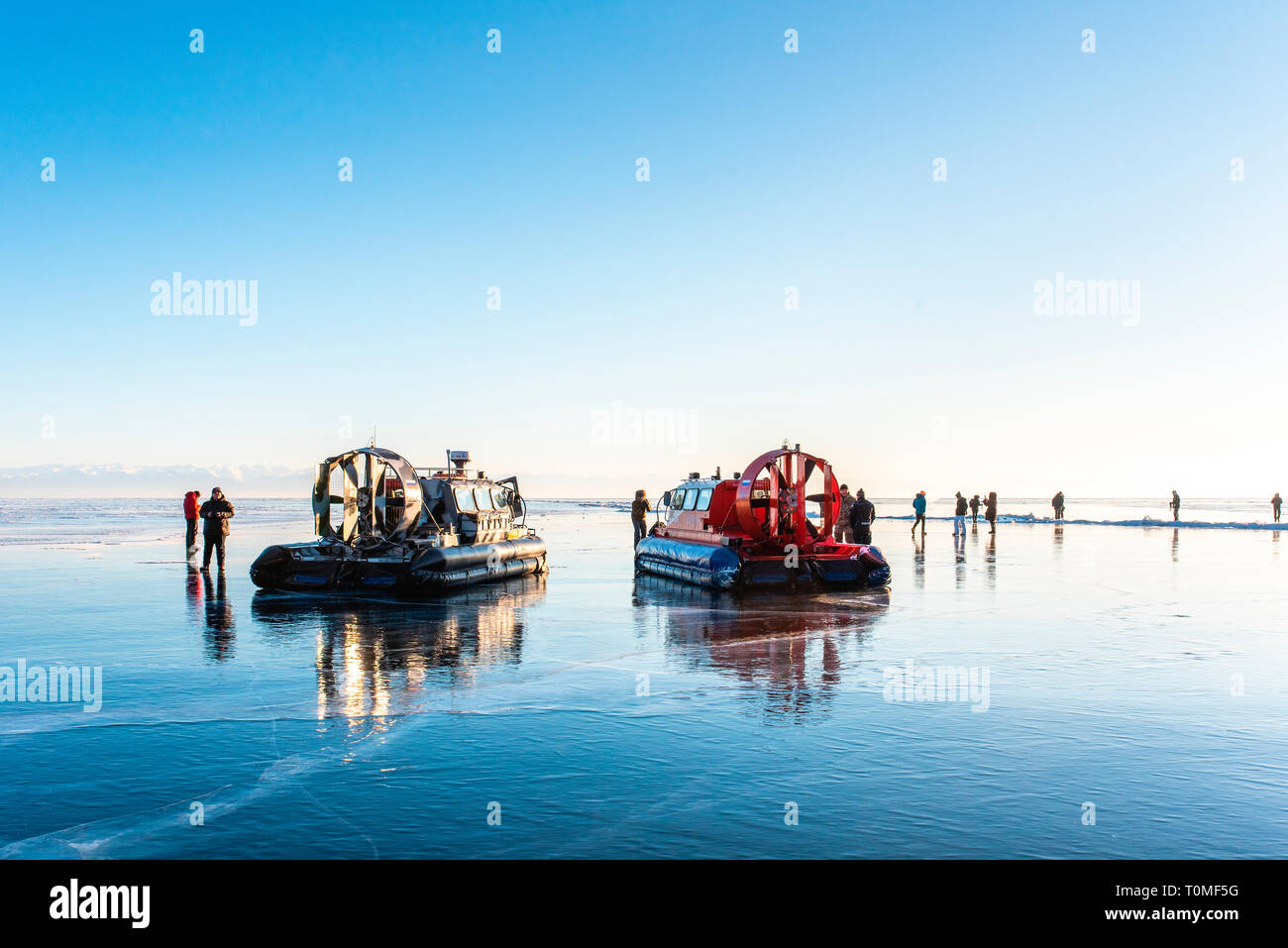 Air cushion boats on the frozen Lake Baikal, Siberia, Russia Stock Photo