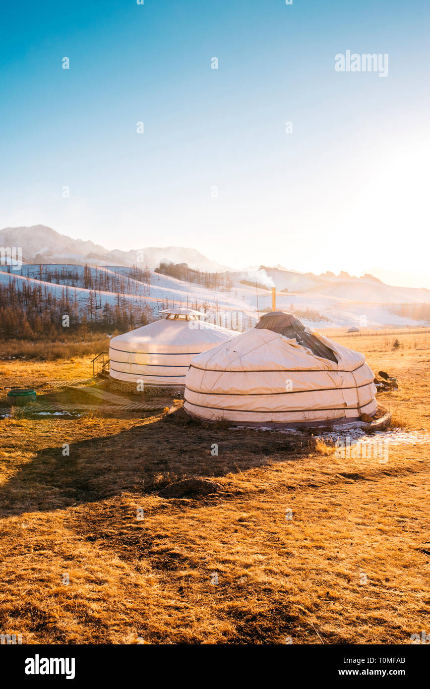 Yurts at sunset in Mongolian Switzerland, Mongolia Stock Photo