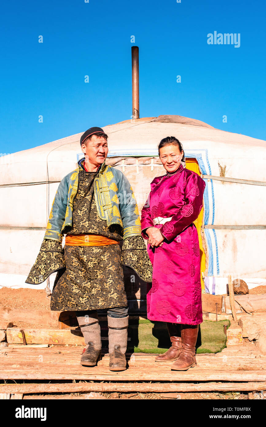 Nomadic couple in front of their yurt in Mongolia Stock Photo