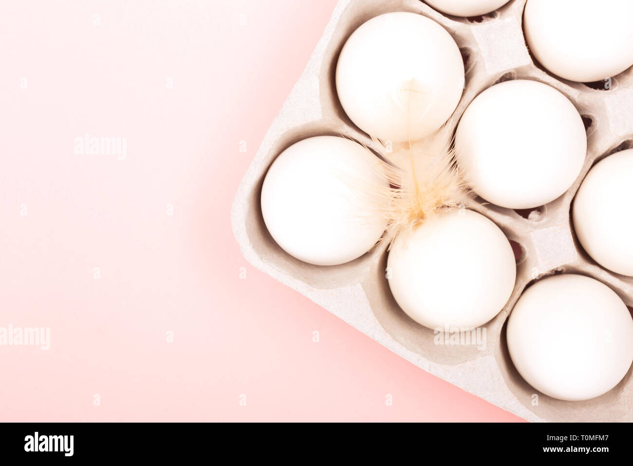 Chicken Eggs In Egg Carton On Pink Background Minimal Composition Flat Lay Top View Copy Space For Your Text Stock Photo Alamy