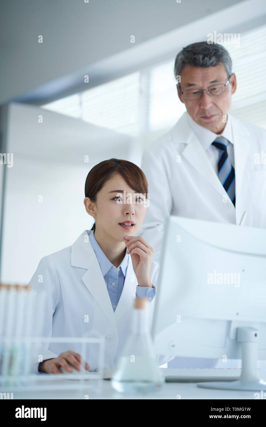 Japanese researchers in the lab Stock Photo Alamy