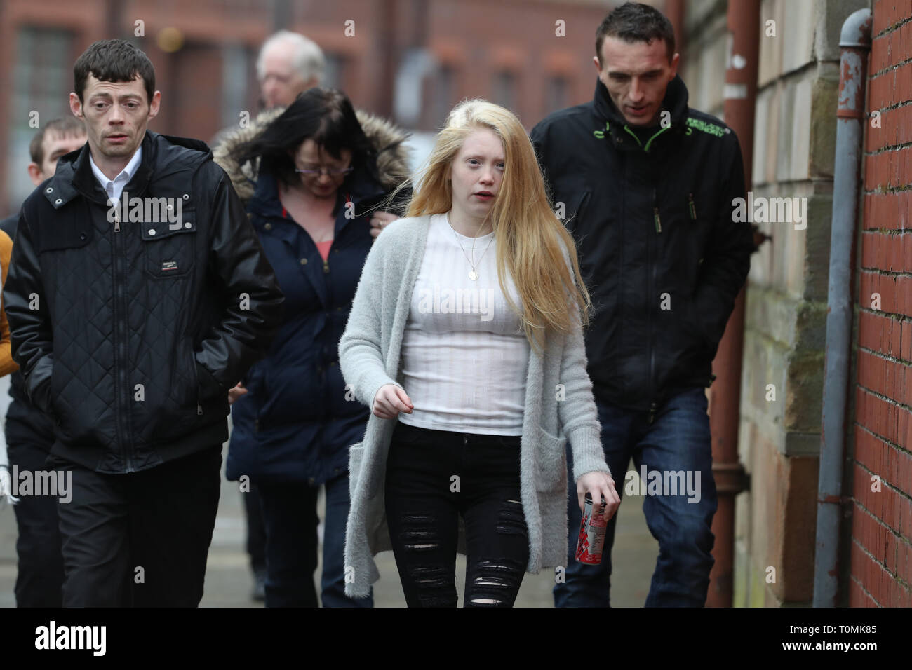 Georgina Lochrane (centre), the mother of Alesha MacPhail, arrives at ...