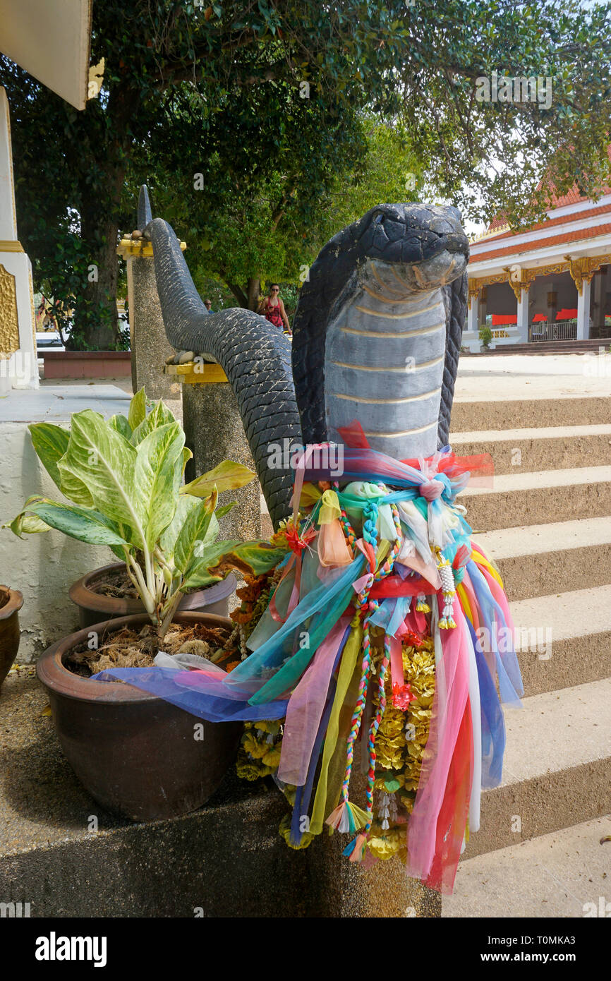 Snake flanked staircase at Golden Chedi, pagoda at Red Temple, Wat Ratchathammaram or Wat Sila Ngu Temple, Koh Samui, Surat Thani, Thailand Stock Photo