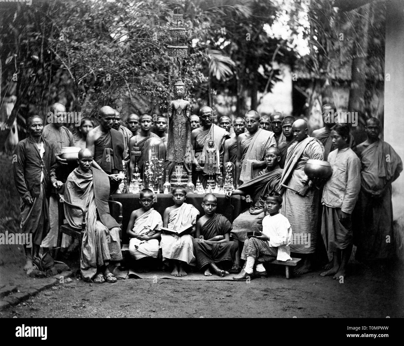 Asia, Sri Lanka, Kandy, Sinhalese priests with Buddhist idols, 1910 Stock Photo