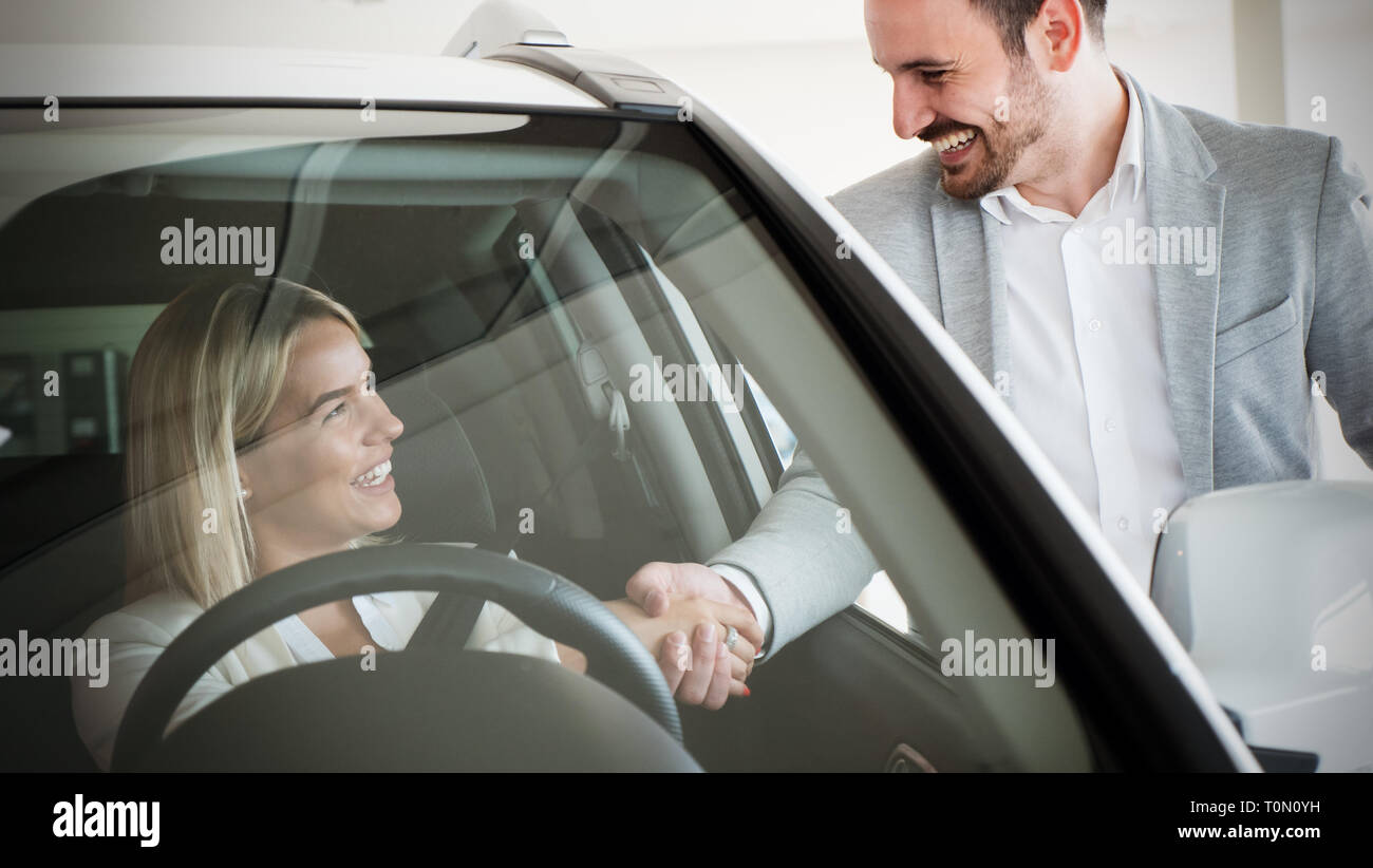 Portrait of happy customer buying new car Stock Photo