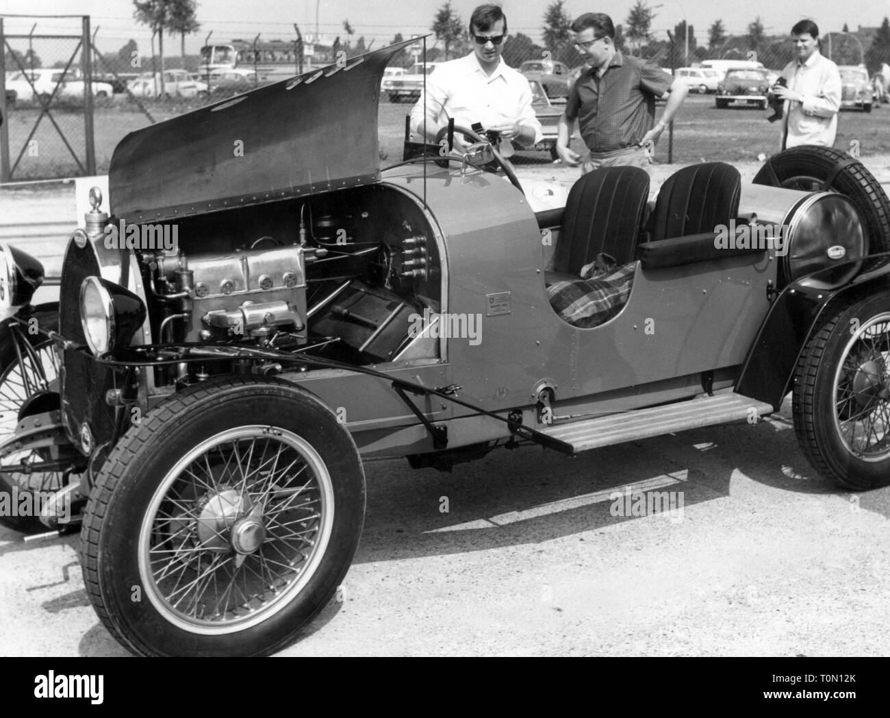 transport / transportation, car, type, Bugatti type 35, year of construction: 1924, view from left, open engine bonnet, 11th international Schnauferl-Rallye, Berlin 9.6. - 23.6.1966, racer, racers, racing car, racing cars, touring car, touring cars, twoseater, vintage car, vintage cars, veteran car rally, Italy, motor car, auto, automobile, passenger car, motorcar, motorcars, autos, automobiles, passenger cars, Germany, 1960s, 60s, 1920s, 20s, 20th century, people, men, man, male, transport, transportation, car, cars, type, types, view, views, en, Additional-Rights-Clearance-Info-Not-Available Stock Photo