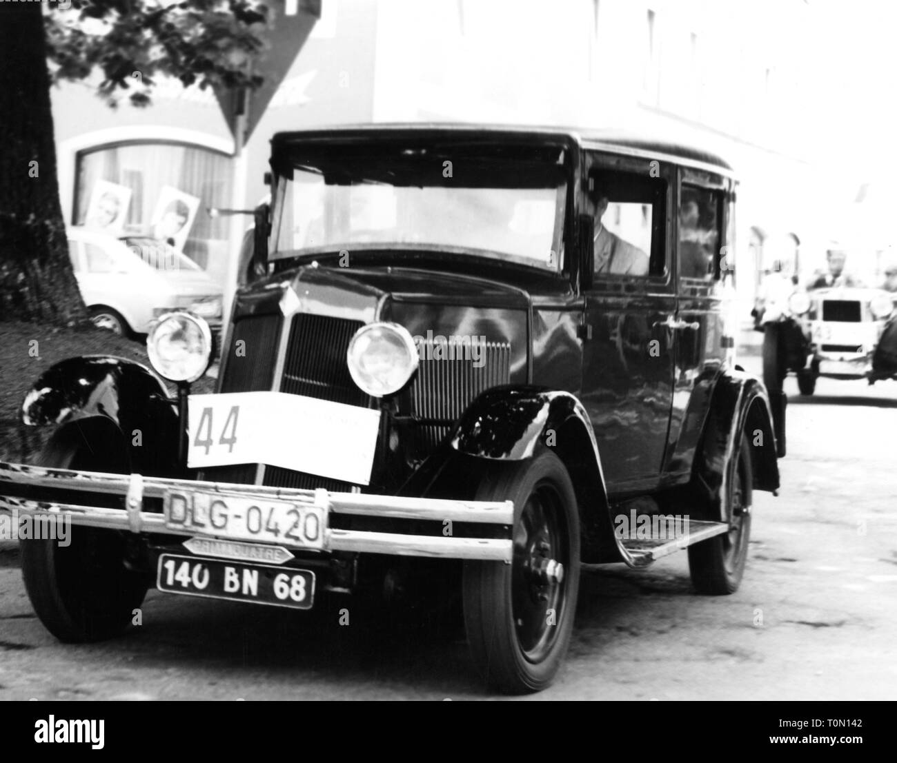 transport / transportation, car, vehicle variants, Renault 10 CV, year of construction: 1928, view from left ahead, during a vintage car rally, Germany, circa 1970, 10CV, type KZ, radiator grill, radiator grille, radiator cowling, radiator grills, radiator grilles, radiator cowlings, round headlight, headlamp, headlights, headlamps, headlight, running board, footboard, limousine, middle class, motor car, auto, automobile, passenger car, motorcar, motorcars, autos, automobiles, passenger cars, French, 1960s, 60s, 1970s, 70s, 20th century, people, , Additional-Rights-Clearance-Info-Not-Available Stock Photo