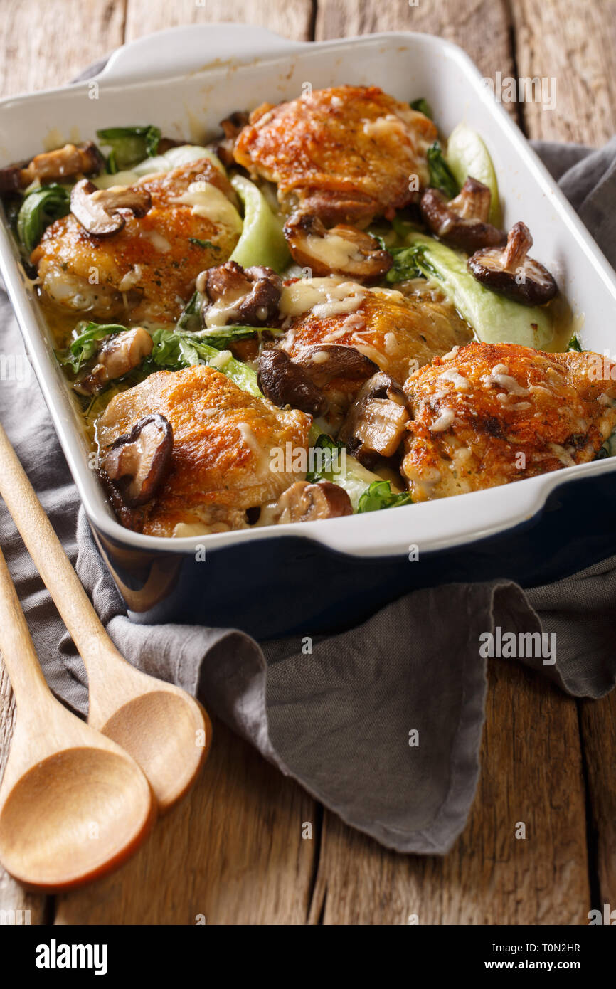 chicken thighs with baby bok choy, shiitake mushrooms and cheese sauce