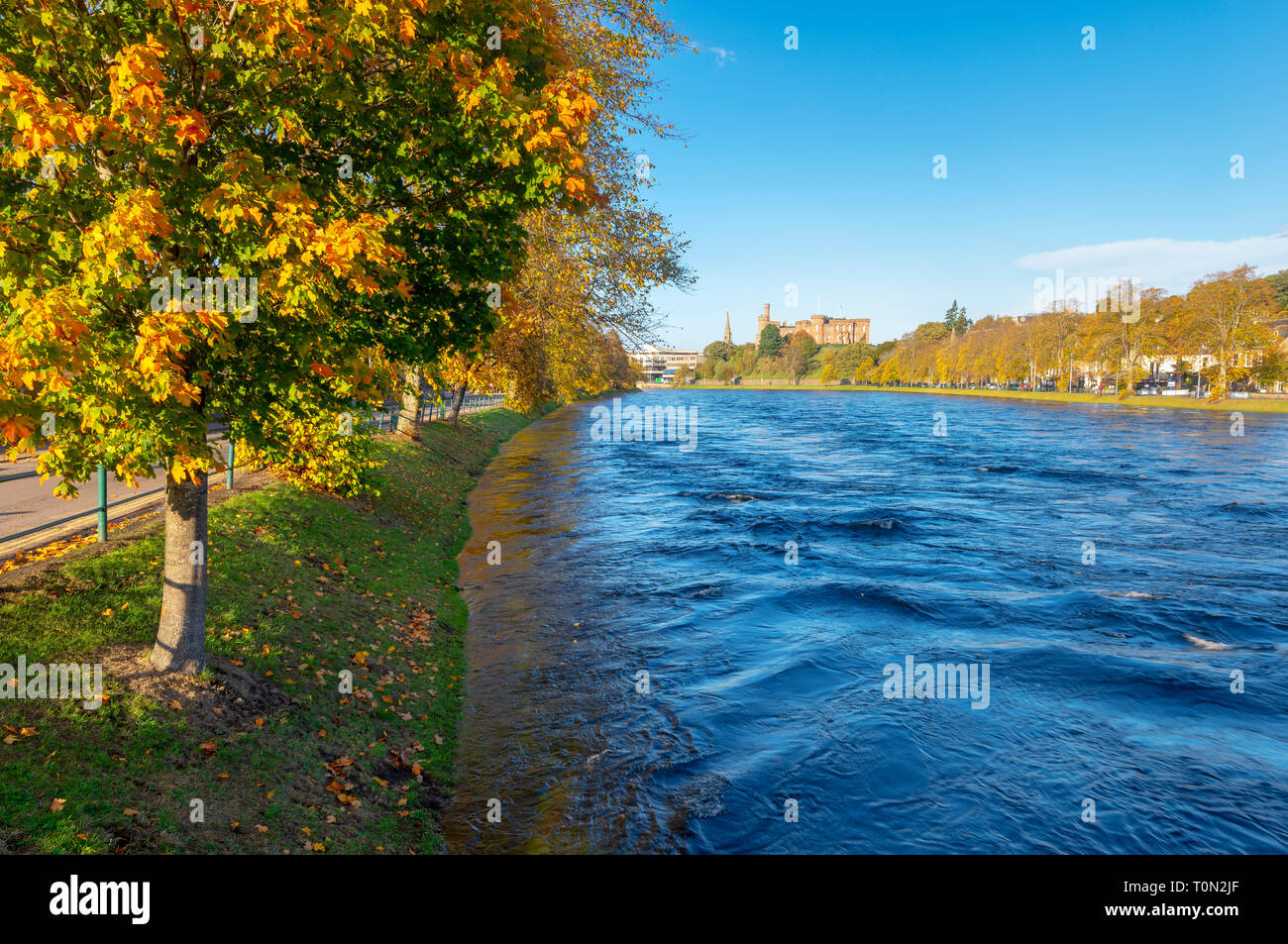 A pretty Inverness view along the River Ness; looking back towards Inverness Castle. Stock Photo