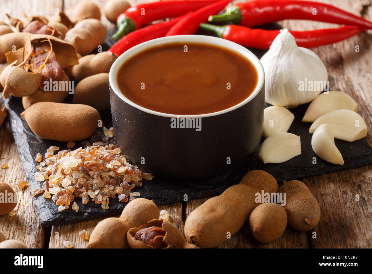 Sweet And Sour Spicy Tamarind Sauce With Ingredients Close Up On A Wooden Table Horizontal Stock Photo Alamy Sweet And Sour Spicy Tamarind Sauce With Ingredients Close Up On A Wooden Table Horizontal Stock Photo Alamy