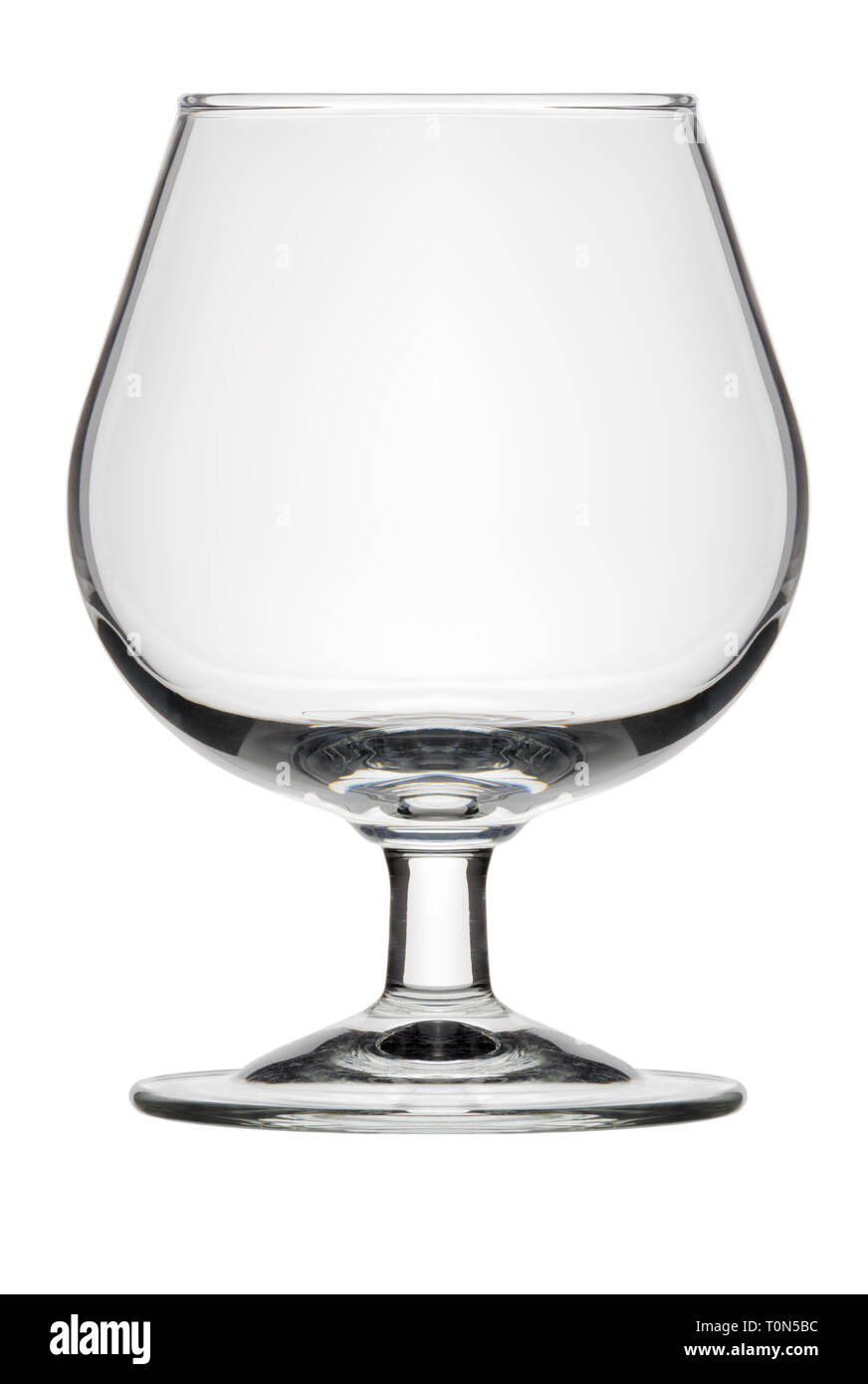 Isolated objects: small single empty classic cognac glass, on white background Stock Photo