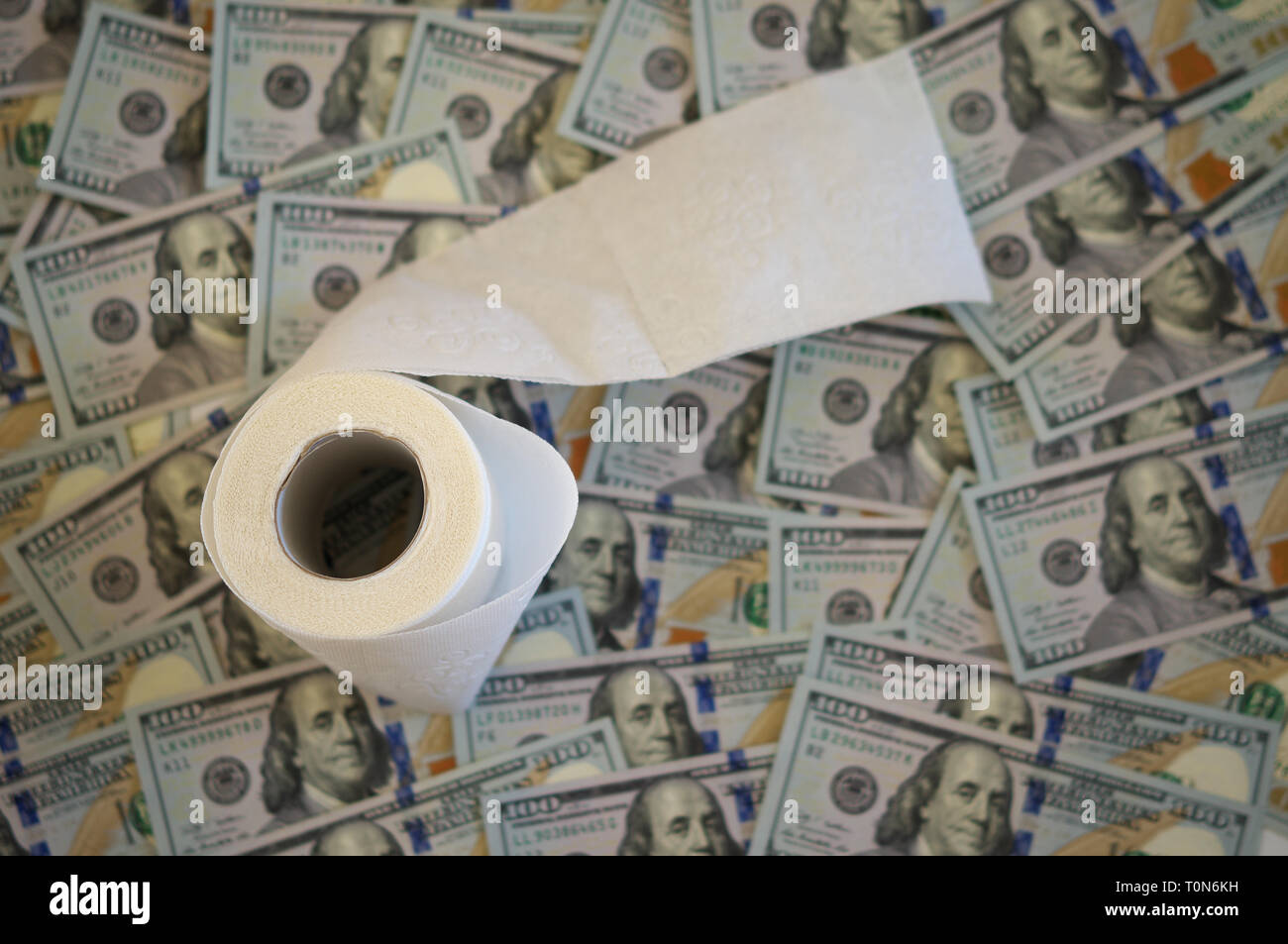 Roll Of Money White Background Stock Photos Roll Of Money White - roll of toilet paper on the background of dollar bills stock image