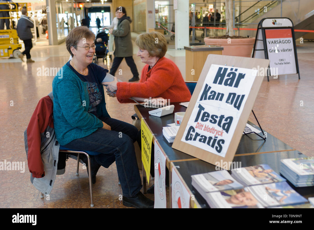 People get to test their blood pressure for free, Upplands Väsby, Sweden. Stock Photo